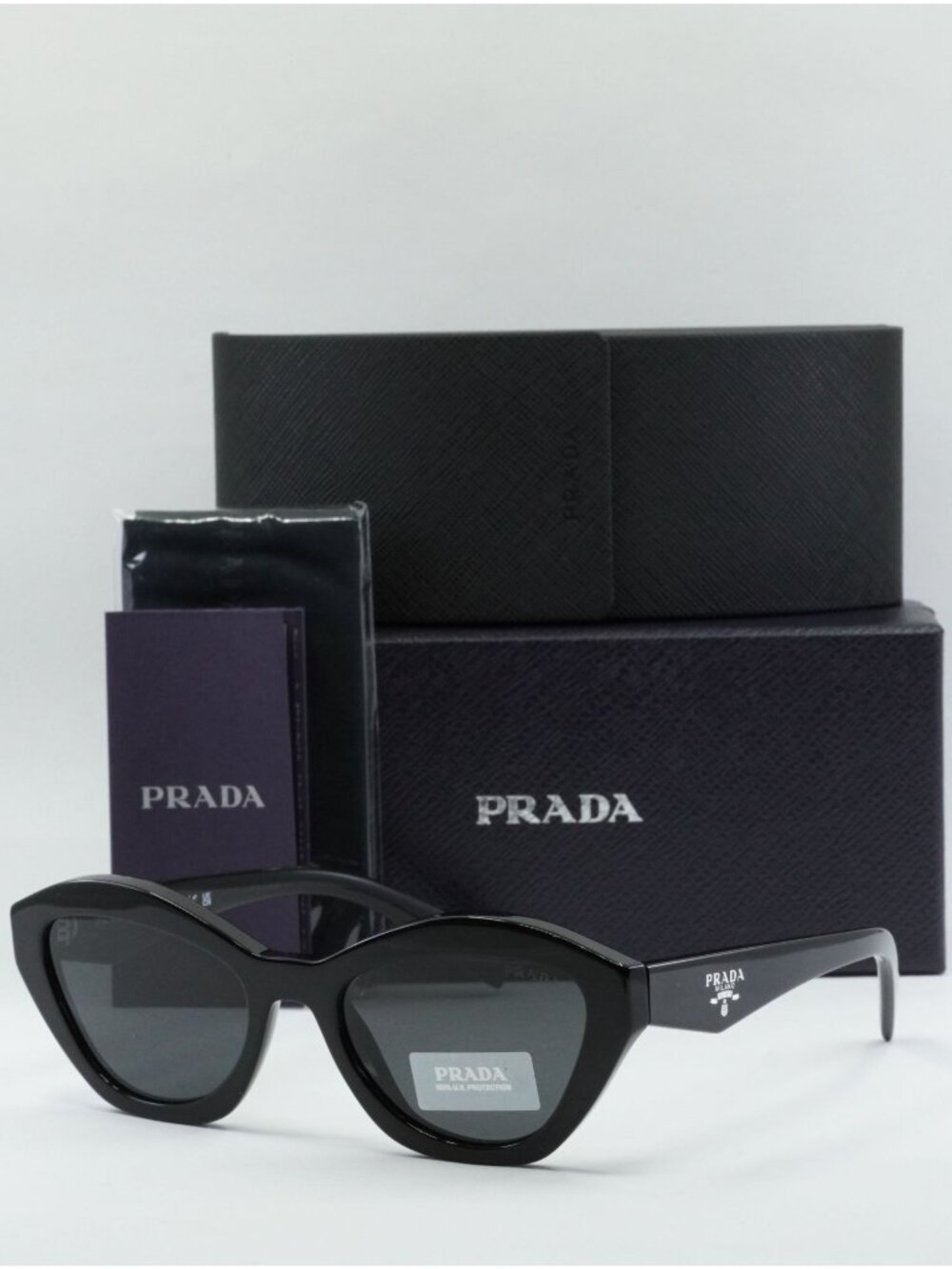 Prada PRA02S 16K08Z Cat Eye Sunglasses – Black\Dark Grey